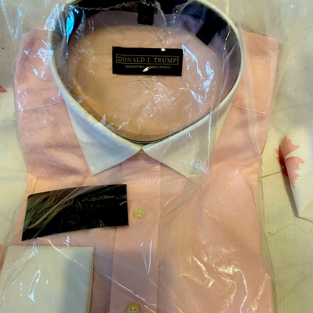 Brand new shirt still in plastic size 16 light pink and white